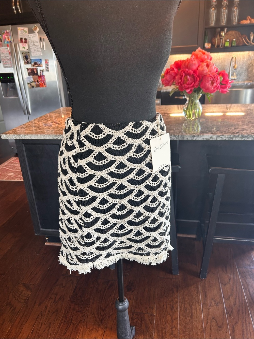 Black Mini Skirt with White Crochet Overlay by Sea of Stars